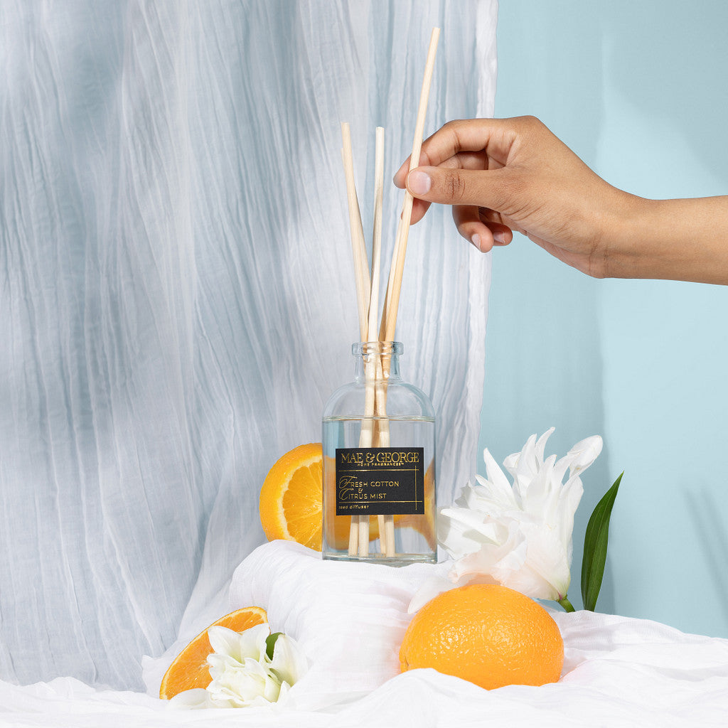 Luxury reed diffuser with natural reeds for long-lasting flameless home fragrance by Mae & George Home Fragrances