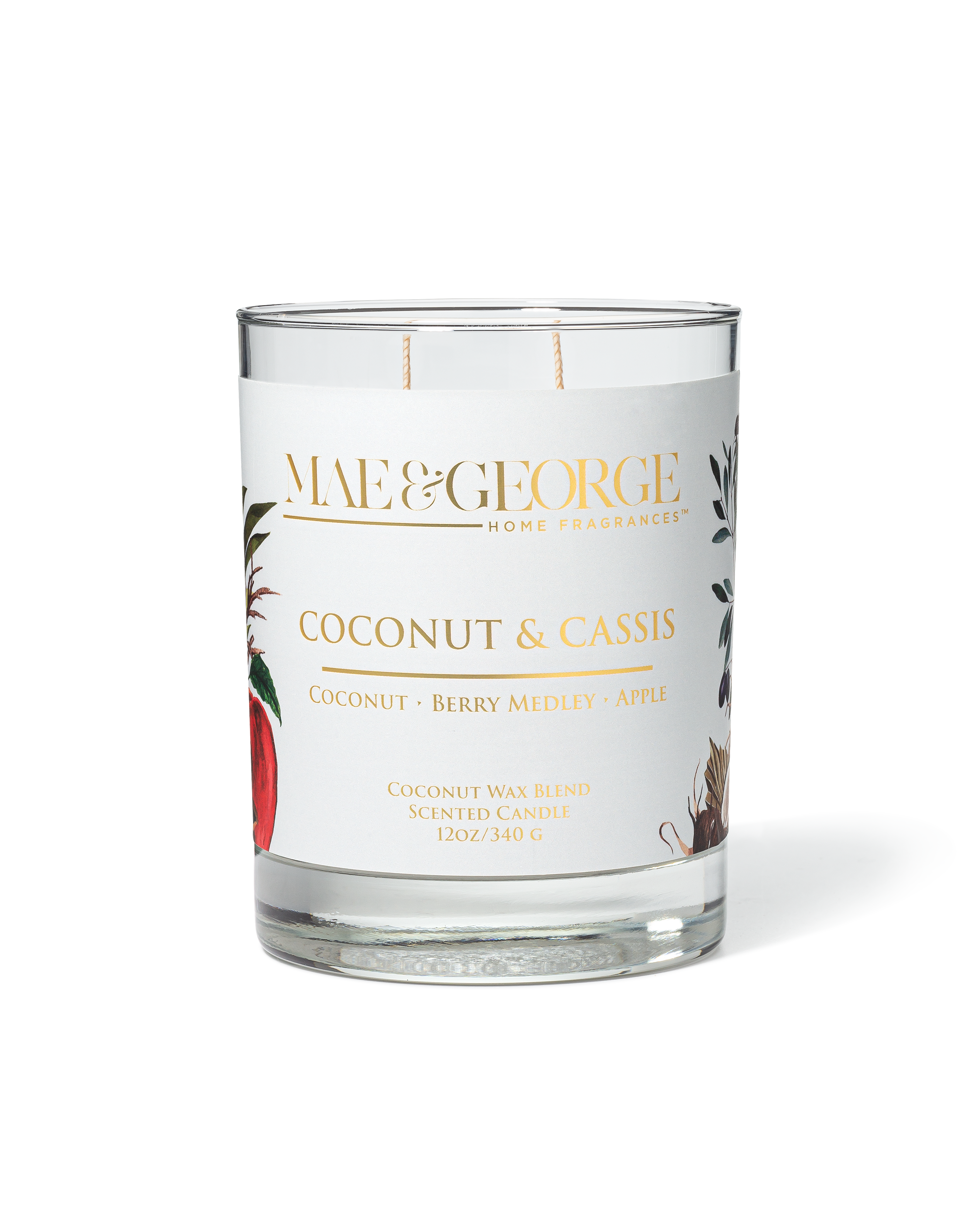 Lit luxury candle with trimmed wick on a clean surface — candle care tips by Mae & George Home Fragrances