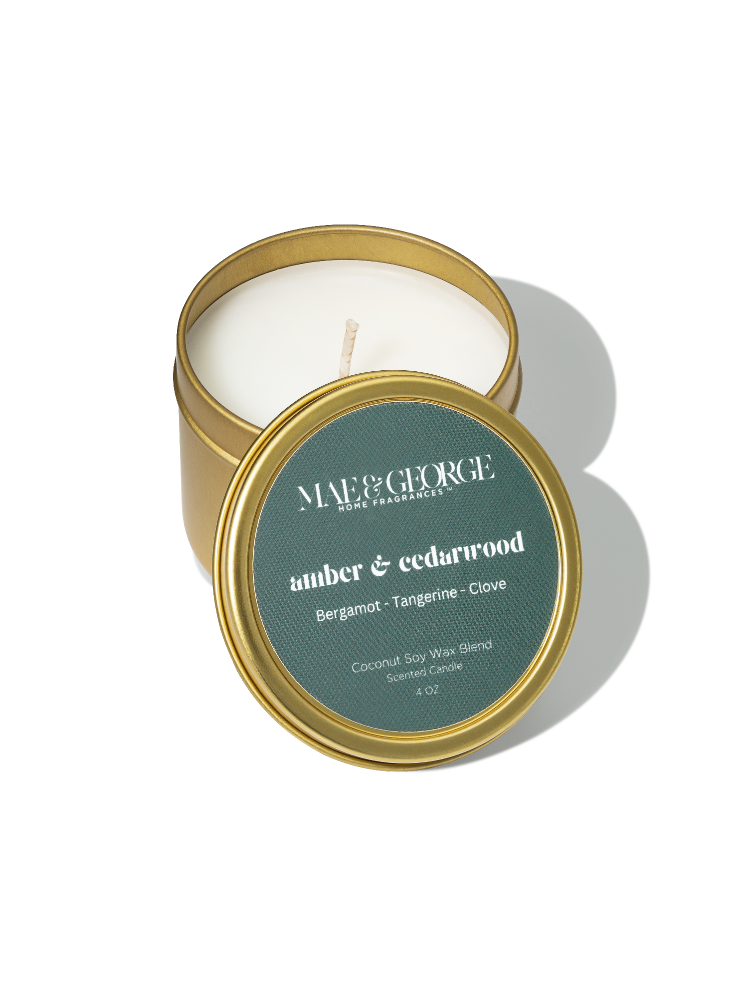 Amber & Cedarwood Travel Candle in a 4 oz gold vessel with lid — Mae & George Home Fragrances
